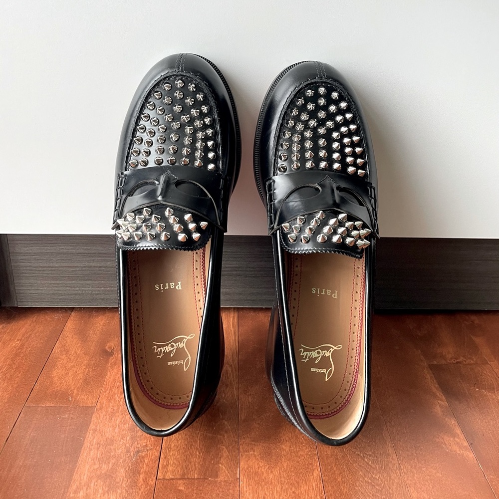 Christian Louboutin men’s authentic black leather Montezu spike loafer.